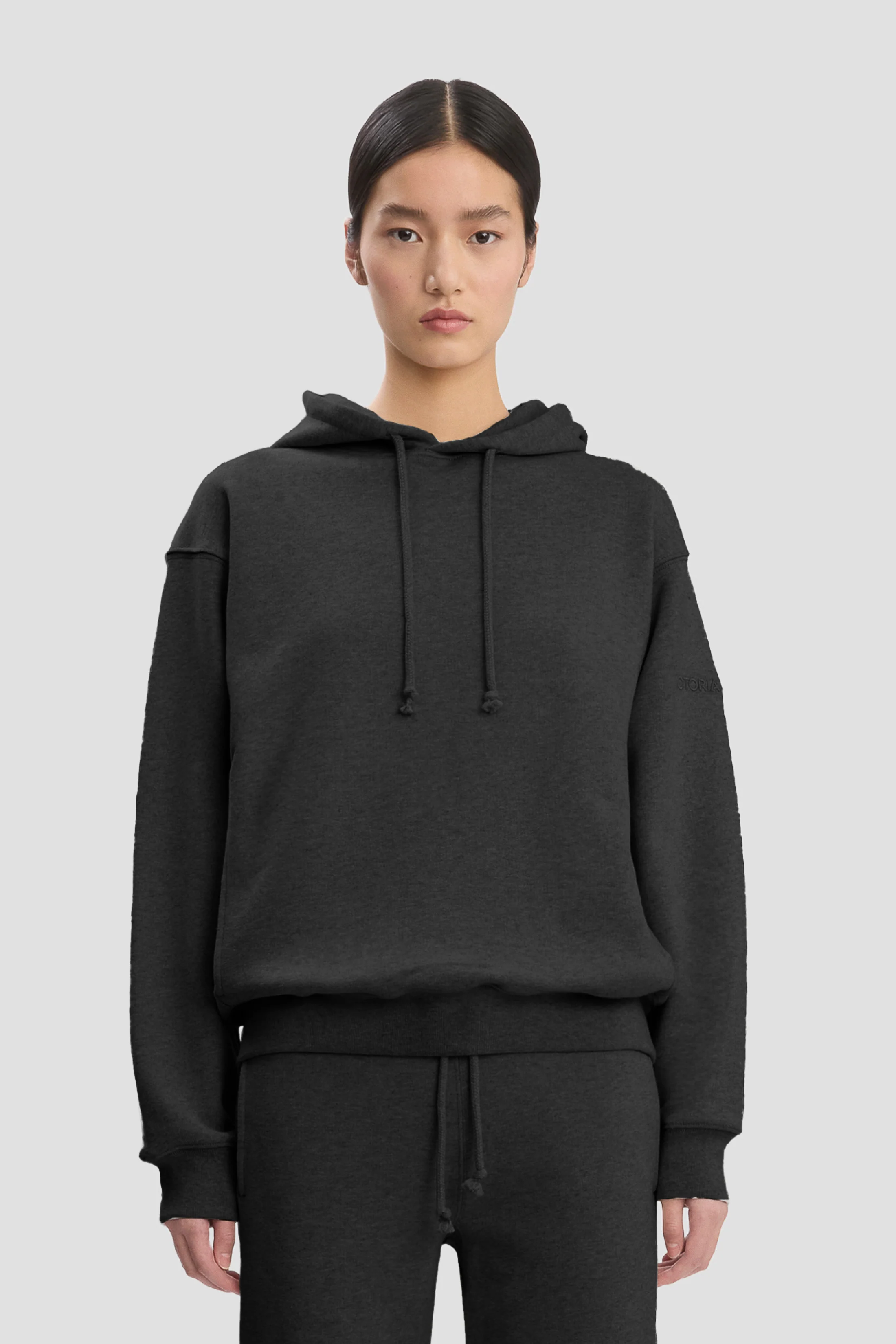 2913-logo-embroidered-hoodie-in-black-1.webp Logo Embroidered Hoodie In Black