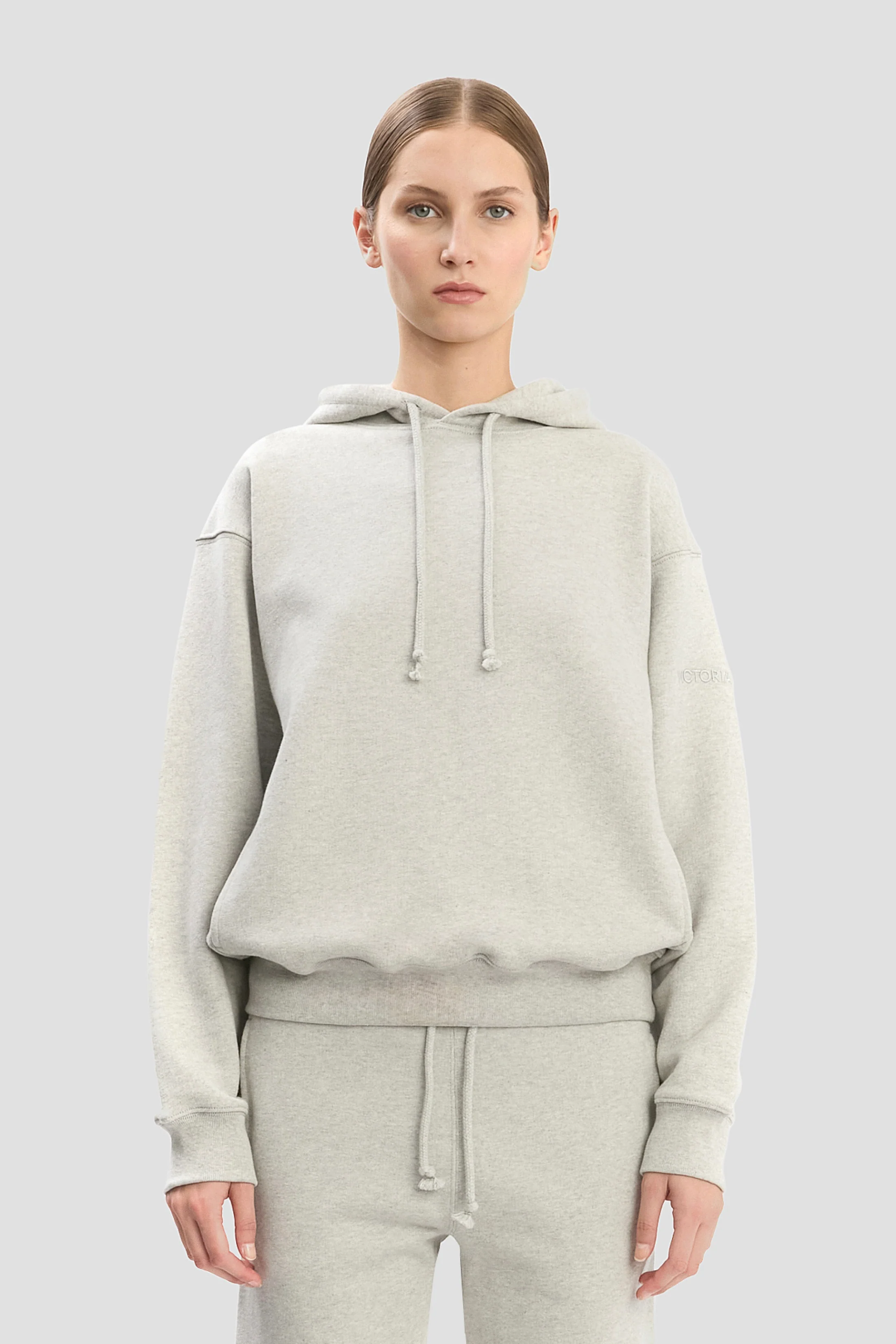 2937-logo-embroidered-hoodie-in-grey-marl-1.webp Logo Embroidered Hoodie In Grey Marl